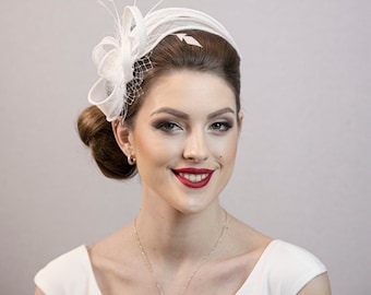 White wedding fascinator. White fascinator. Made to order, depending on what side of the head you want to wear it.