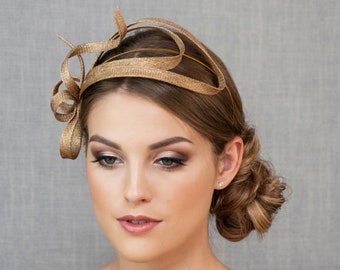 Gouden fascinator. Gouden hoofdband.