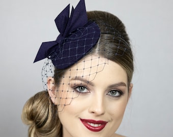 Dark blue small fascinator hat with face veil. Blue minimalist felt hat for women. New design from 2024 collection.