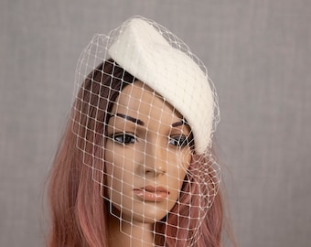 Natural white (light ivory) wedding hat. Minimalist felt percher. Bridal hat with face veil.