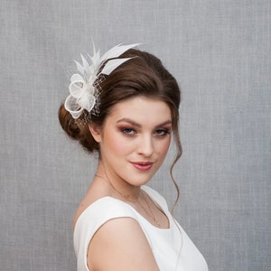 White wedding fascinator. White feather fascinator for your special occasions. image 2