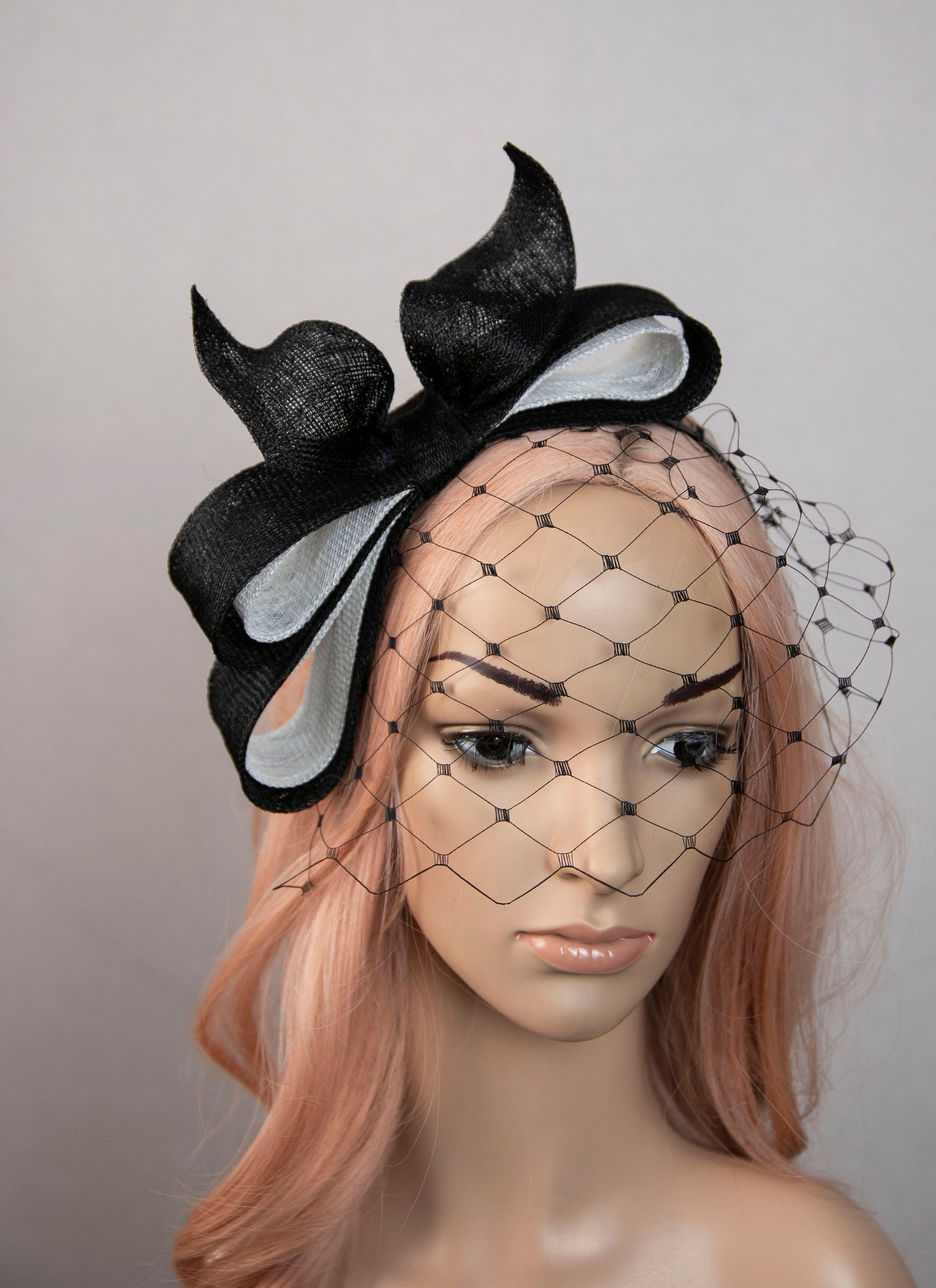 Black and white haute couture fascinator headpiece. Black and white hat