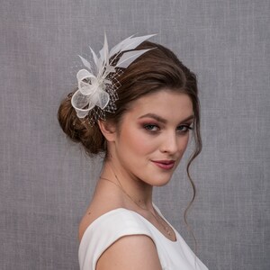 White wedding fascinator. White feather fascinator for your special occasions. image 3