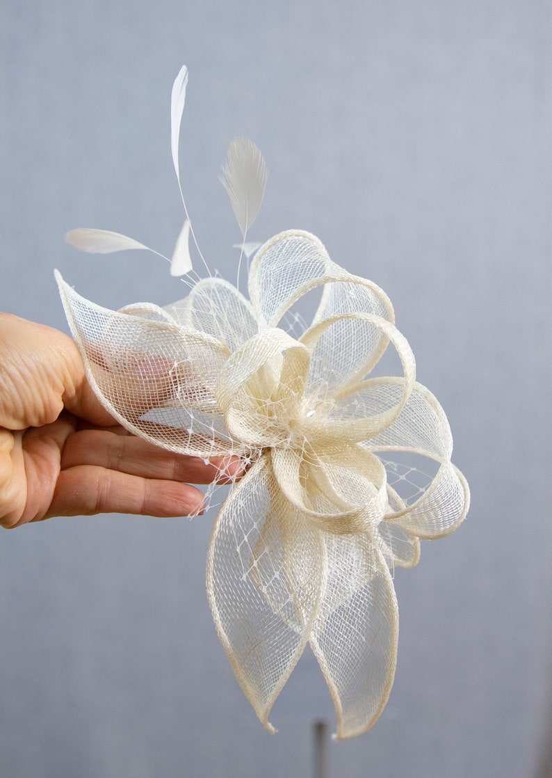 White wedding fascinator with feathers image 10