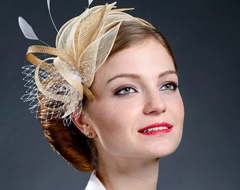 Champagne and golden fascinator for your special occasions.