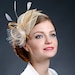 Champagne and golden fascinator for your special occasions.
