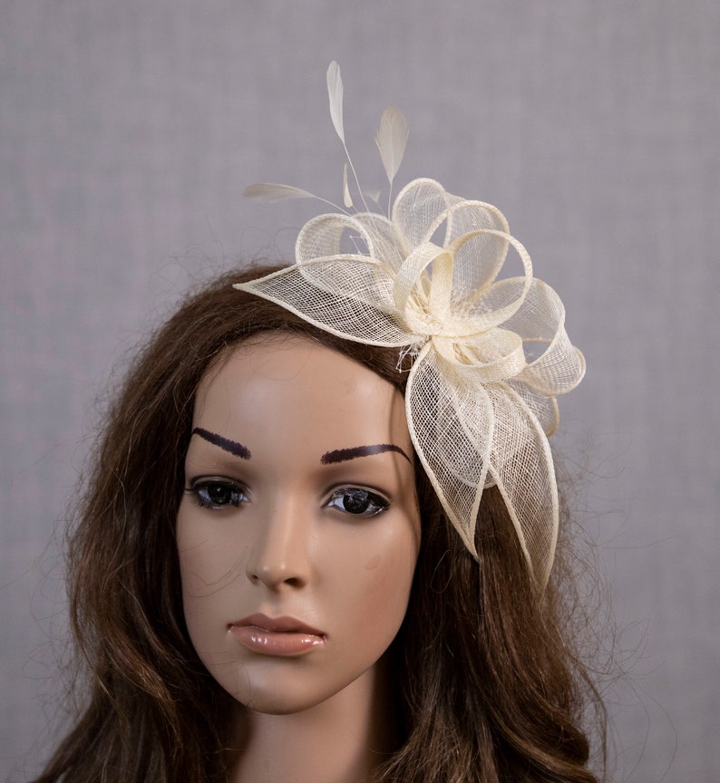 White wedding fascinator with feathers image 9