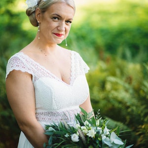 White wedding fascinator. White feather fascinator for your special occasions. image 6