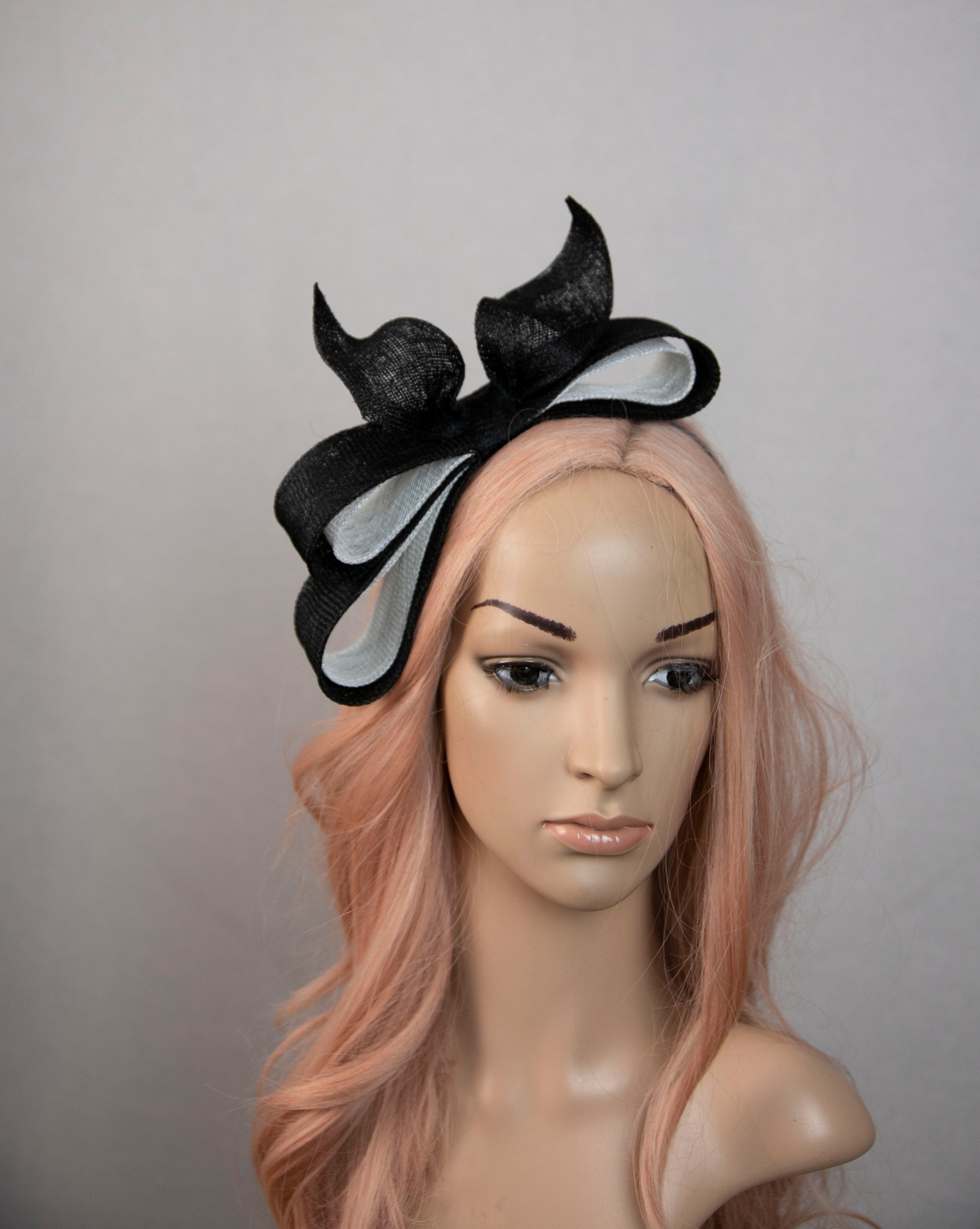 Black and white haute couture fascinator headpiece. Black and white hat