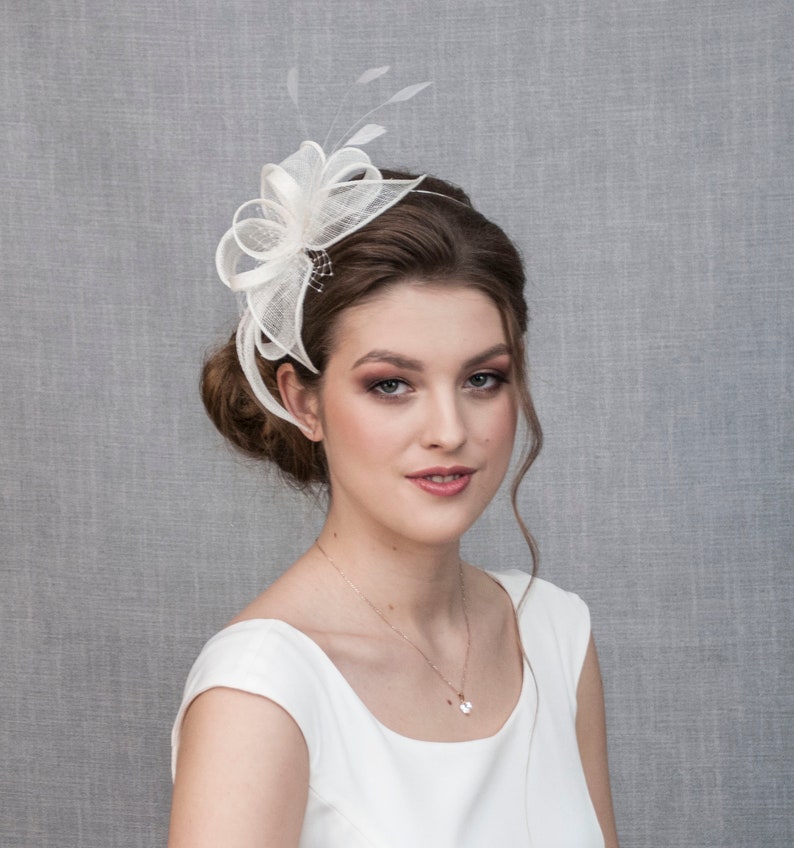 White wedding fascinator with feathers image 1