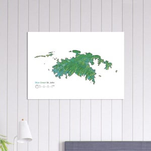 May include: A topographic map of St. John, a small island in the Caribbean Sea. The map shows the island's terrain, with green and blue colors representing different elevations. A scale bar is included at the bottom of the map, indicating that 3 km is equal to 2 inches.