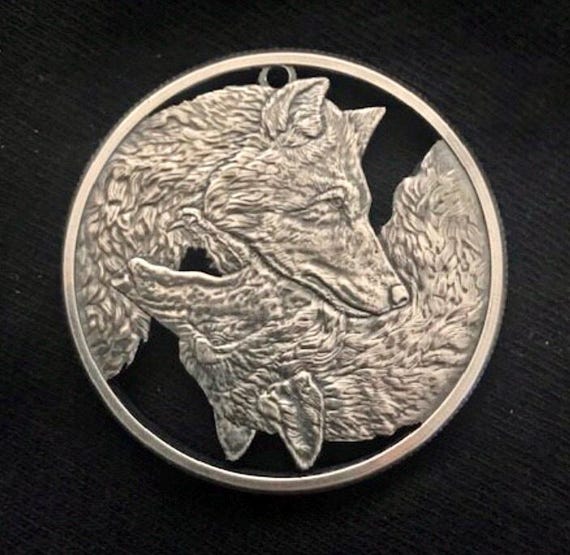 thumbnail interactive-video image 1 of Antiqued Sterling Silver Howling Wolf Hobo Coin Round Charm Pendant Necklace 1 of 6