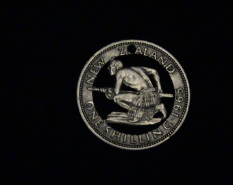 1965 New Zealand - cut coin pendant - w/ Maori Tribesman Hunter
