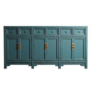 May include: A long, rectangular teal sideboard cabinet featuring six drawers across the top and three sets of double doors below. The piece has a distressed finish with visible wear along the edges and is accented with brass-toned metal hardware.