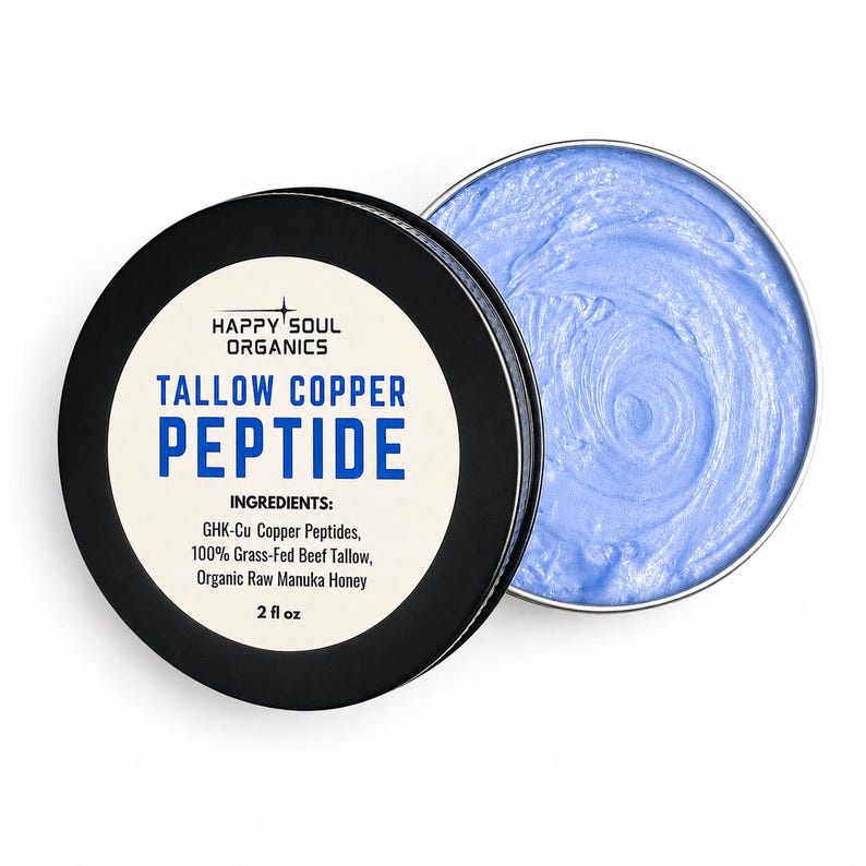 May include: A round metal tin containing light blue cream, with a black lid featuring the text HAPPY SOUL ORGANICS, TALLOW COPPER PEPTIDE, and a list of ingredients including GHK-Cu Copper Peptides, 100% Grass-Fed Beef Tallow, and 2 fl oz.