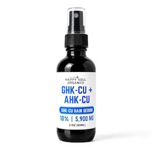 May include: A black glass spray bottle containing GHK-CU + AHK-CU hair serum by Happy Soul Organics. The white label features blue text reading GHK-CU + AHK-CU, GHK-CU HAIR SERUM, 10% | 5,900 MG, and 2 OZ (60ML) at the bottom with a black spray nozzle.