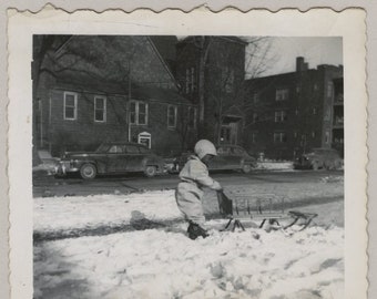 Original Vintage Photo Snapshot Bundled Up Child Snow & Sled 1950s