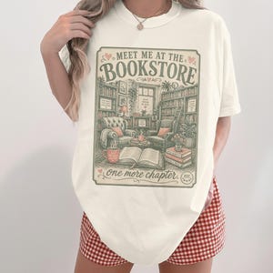 Cream t-shirt with "Meet me at the Bookstore" graphic, vintage style.
