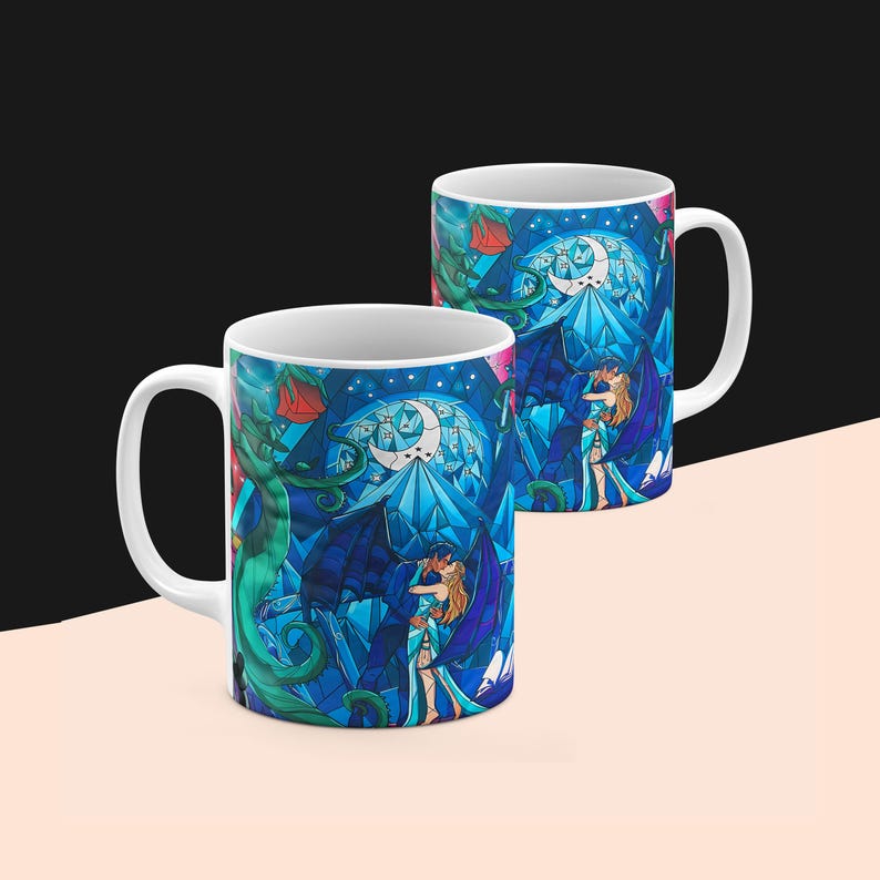 a couple of coffee mugs sitting on top of a table