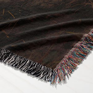 a close up of a blanket on a table