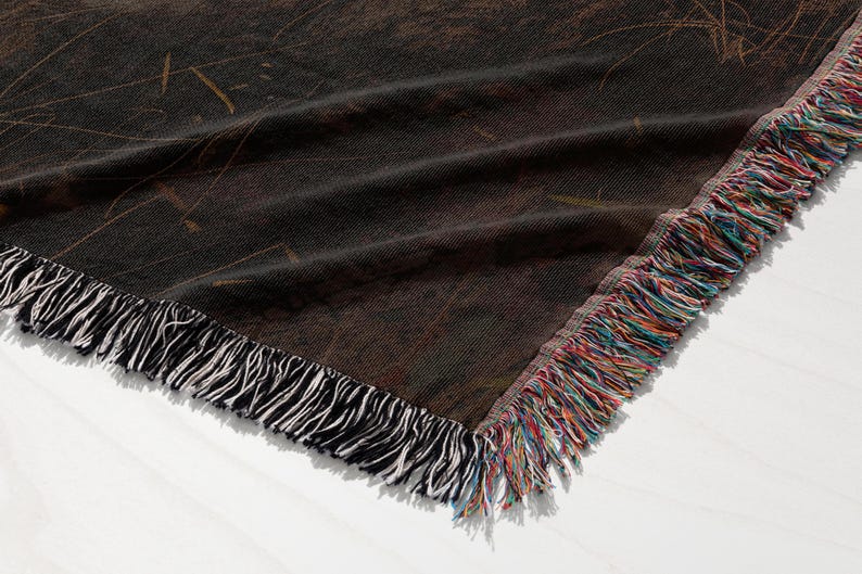 a close up of a blanket on a table