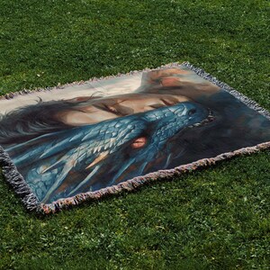 a blanket with a picture of a woman on it