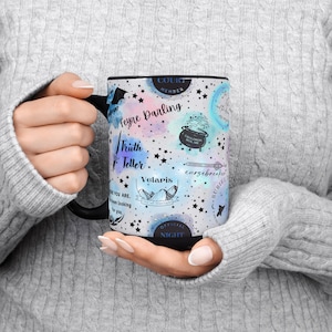 a woman holding a coffee mug in her hands