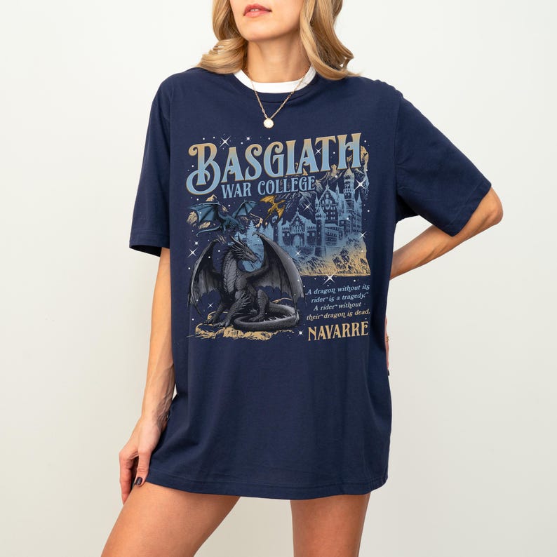 a woman wearing a t - shirt with a picture of a batgirl on it