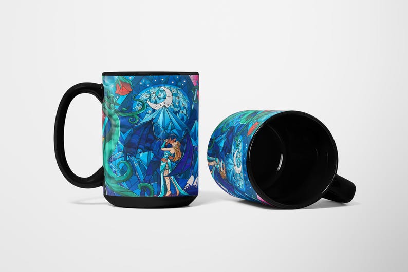 a couple of coffee mugs sitting next to each other
