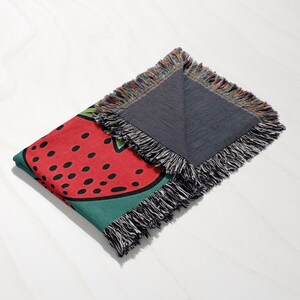 a piece of cloth with a watermelon design on it