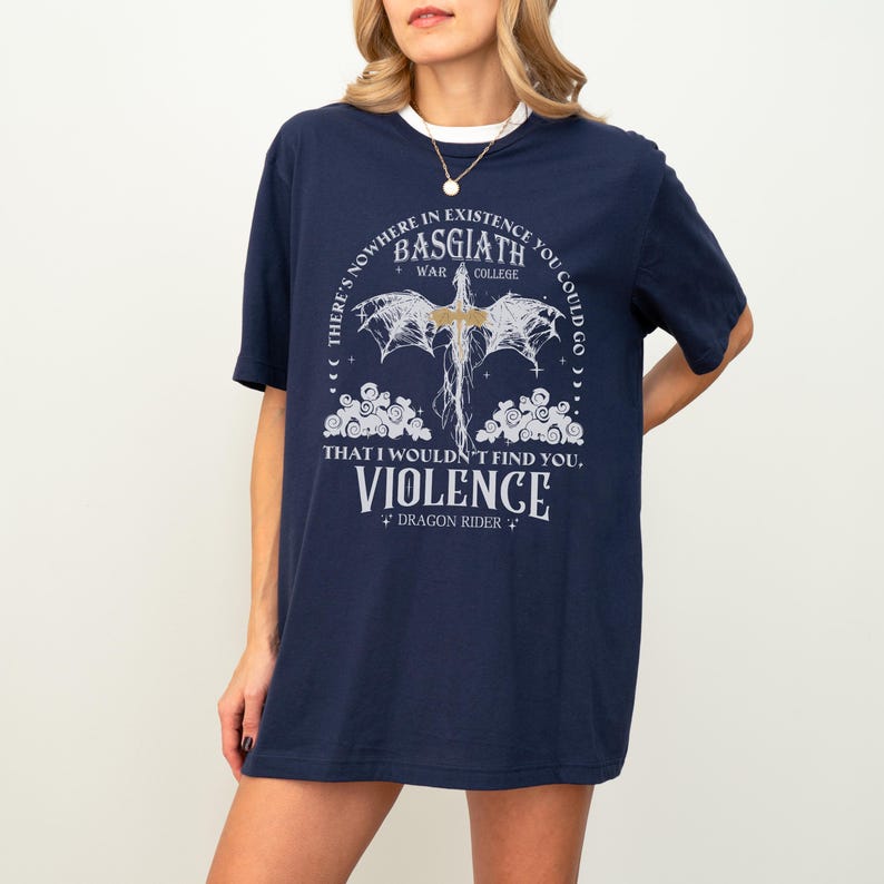a woman wearing a t - shirt with a sword on it
