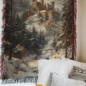 a tapestry hanging on the wall of a bedroom