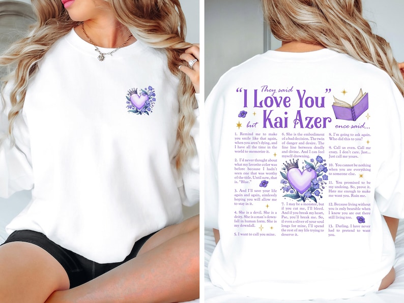 a woman sitting on a bed wearing a t - shirt that says i love you