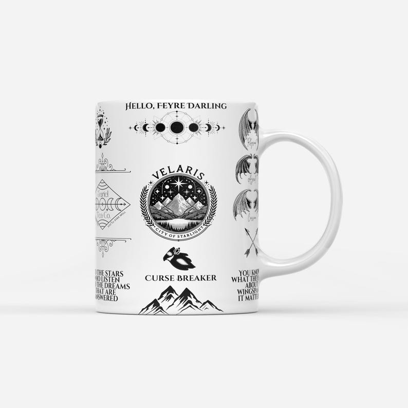 a white coffee mug with a black and white design on it