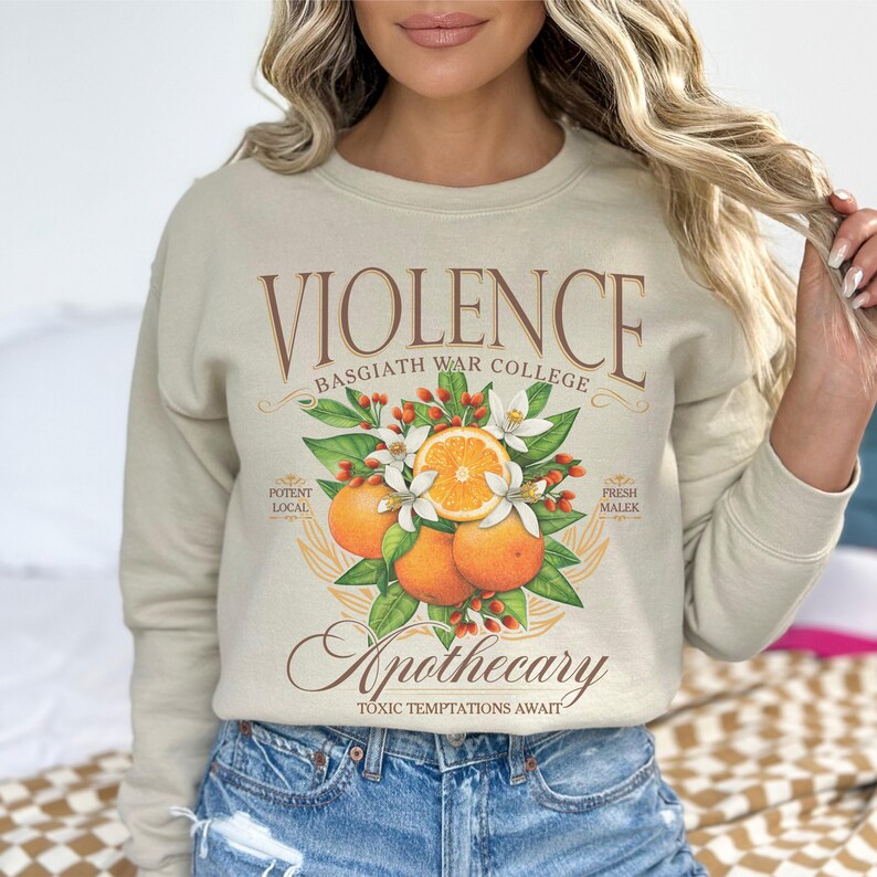 a woman wearing a sweatshirt that says violence