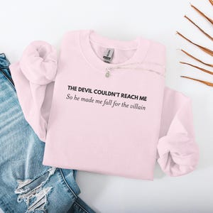 The Devil Couldn't Reach Me Shirt, Fall For The Villain Sweatshirt, Cute Graphic Tee, Fun Slogan Top For Women, Casual Wear Pullover
