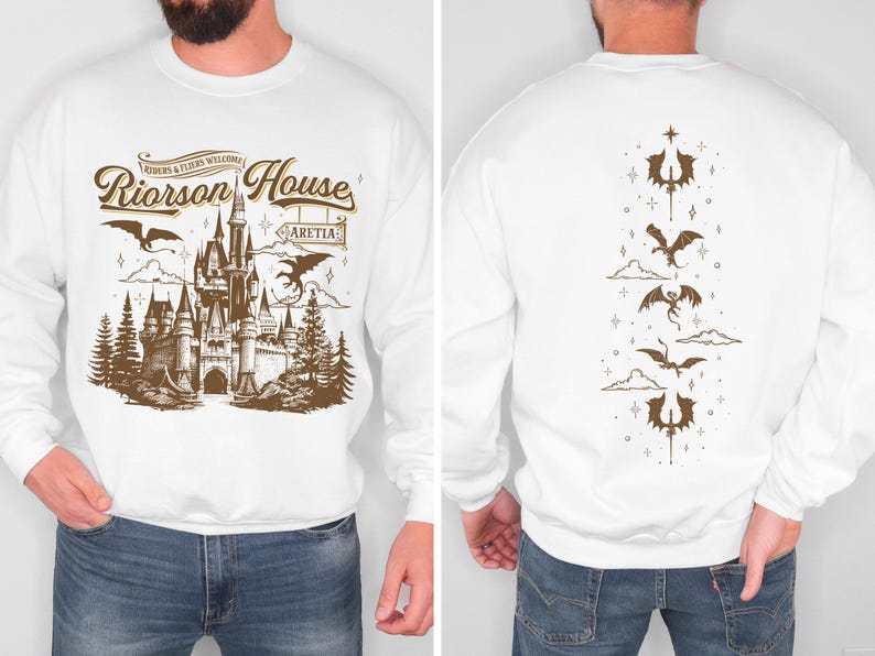a man wearing a white sweatshirt with a picture of a castle on it