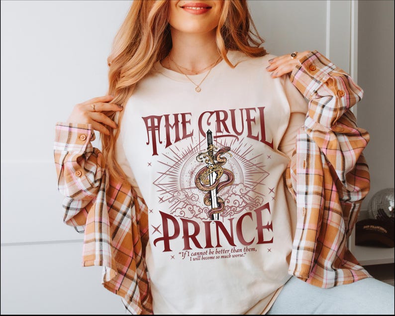 a woman wearing a t - shirt that says the cruel prince