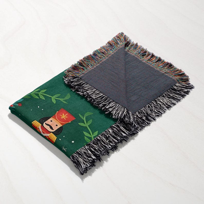 a blanket with a picture of a nutcracker on it
