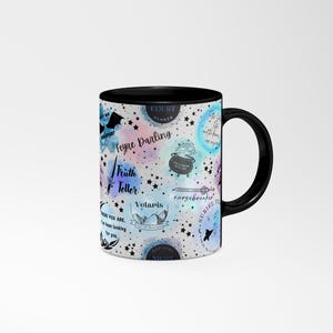 a black and white coffee mug with a pattern on it