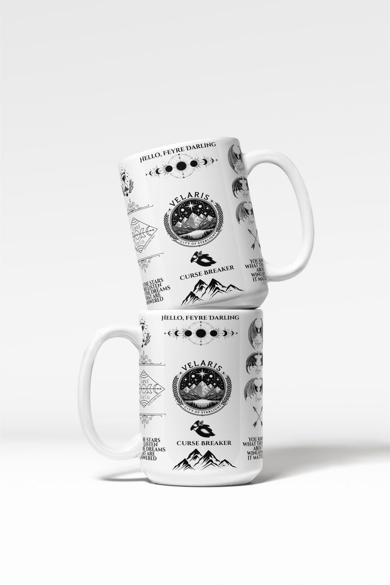 two coffee mugs stacked on top of each other