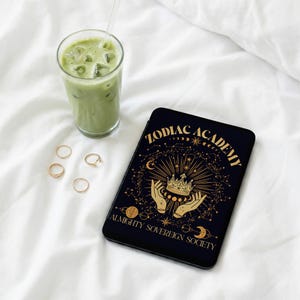 May include: A set of three ceramic nesting bowls in shades of blue, green, and white. The bowls feature a speckled glaze and a simple, modern design. The largest bowl is approximately 7 inches in diameter.