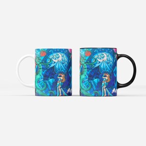 a couple of coffee mugs sitting next to each other