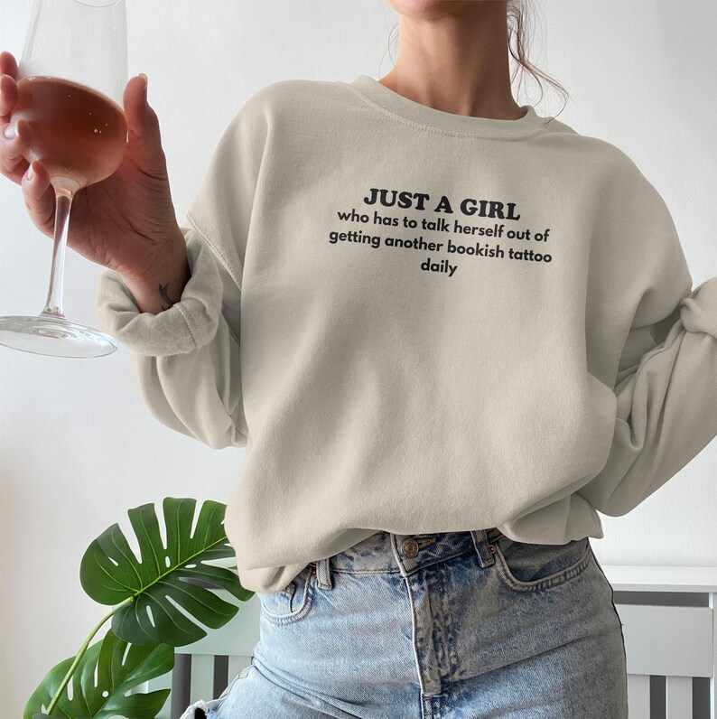 Just a girl who has to talk herself out of getting another bookish tattoo daily sweatshirt, cozy casual wear, literature lover gift