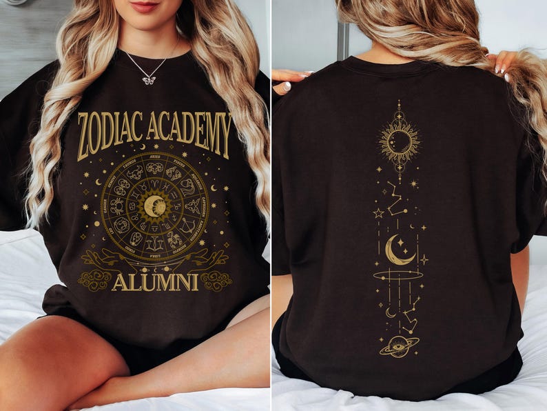 a woman sitting on a bed wearing a zodiac t - shirt