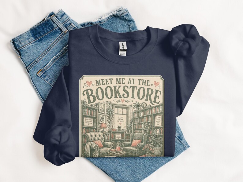 Dark navy sweatshirt with vintage bookstore graphic and text.