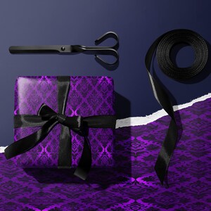 Purple gift wrapping paper, black ribbon and scissors set, decorative wrap for special occasions, holiday and birthday present wrapping