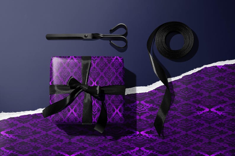 Purple gift wrapping paper, black ribbon and scissors set, decorative wrap for special occasions, holiday and birthday present wrapping