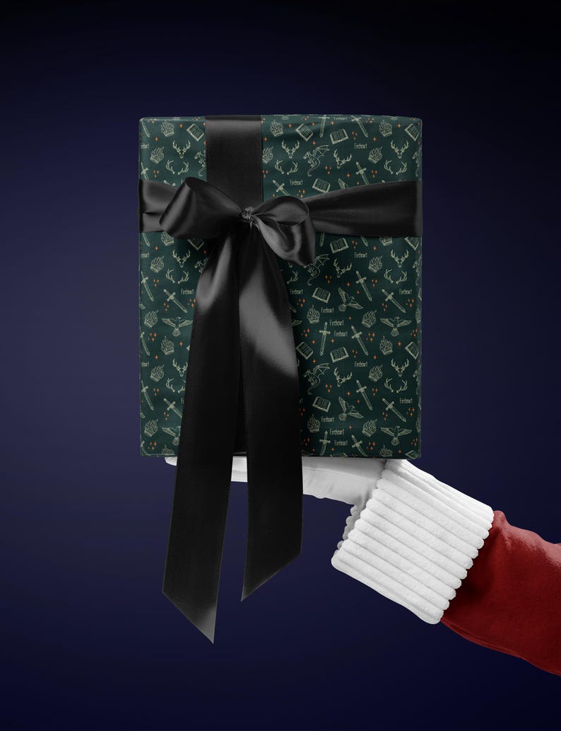 A gift wrapped in green paper with a black ribbon, held by a hand wearing a red glove against a dark blue background.