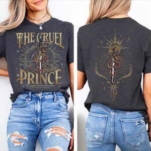 a woman wearing a t - shirt with a cross on it